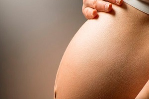 Barriga deuma mulher grávida