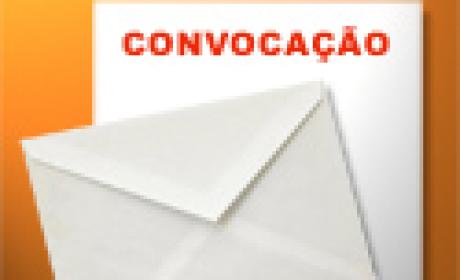 Envelope sobre uma página onde está escrito convocação