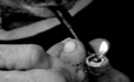 Foto: Fiotec / Fiocruz Detalhe de rosto de homem consumindo crack