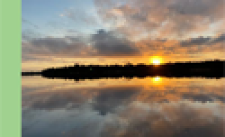 Imagem: Ensp Capa da revista de a foto de um pôr do sol, na beira de um rio