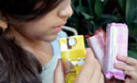 Imagem: Ensp Menina tomando suco industrializado